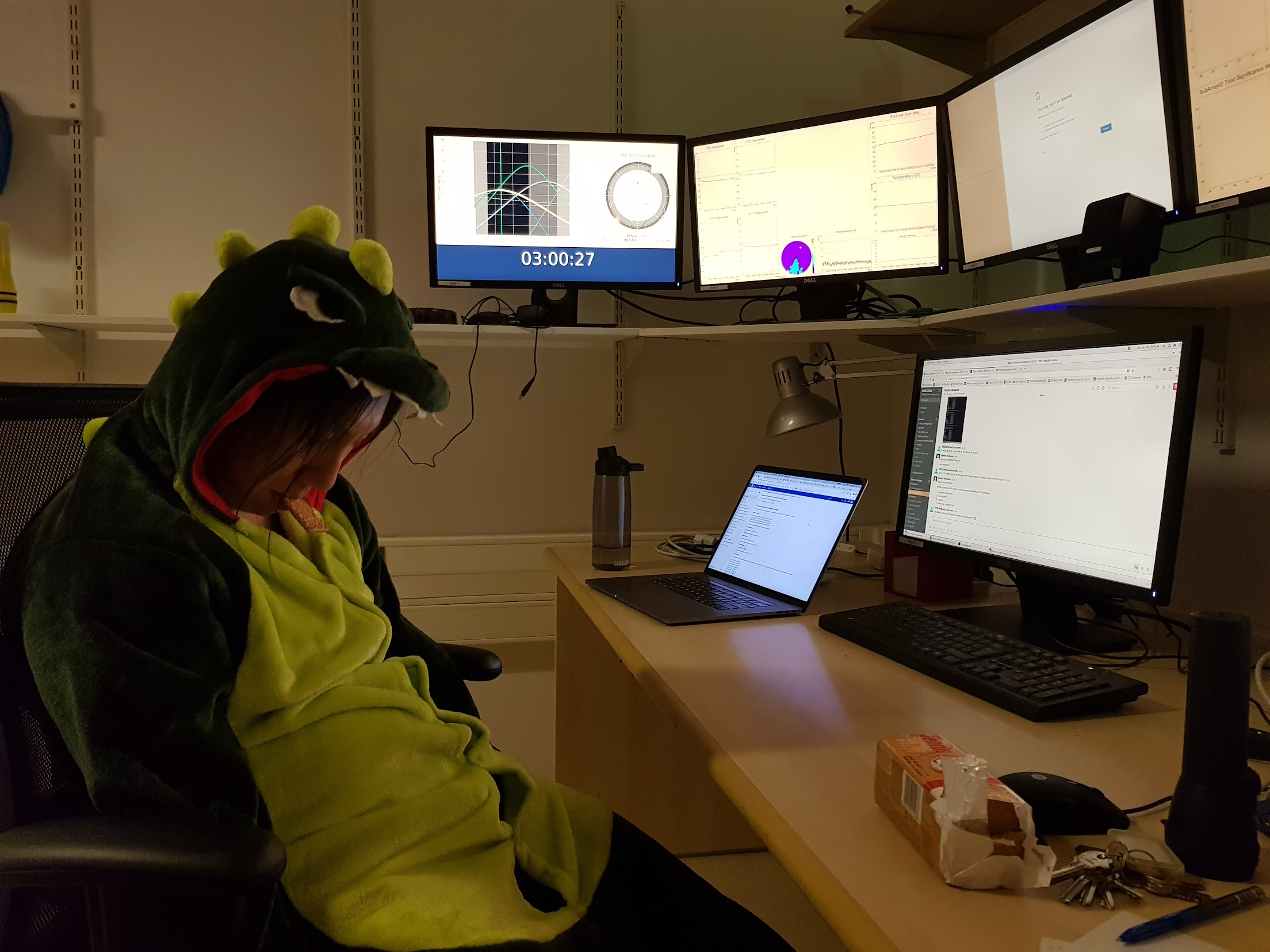 Photo of Sylvia J Zhu in the control room in H.E.S.S being tired after DAQ trouble shooting